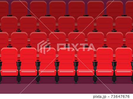 Red chairs in movie theater 73647676