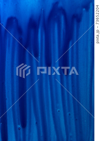 Abstract hand painted blue watercolor splash on white paper background, Creative Design Templates Abstract hand painted blue watercolor splash on white paper background, Creative Design Templates 73652204