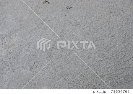 Gray concrete floor texture background . Empty rough stucco Gray concrete floor texture background . Empty rough stucco 73654762