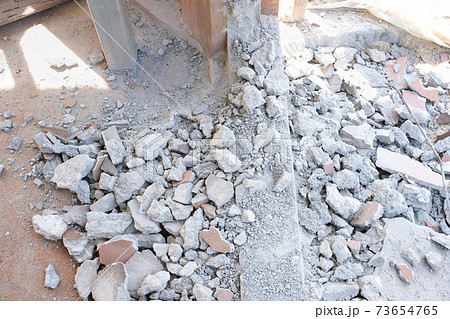 Top view concrete debris from drilling . Home renovation concept Top view concrete debris from drilling . Home renovation concept 73654765