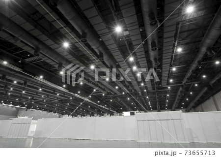 HVAC Duct Cleaning, Ventilation pipes in silver insulation material hanging from the ceiling inside new building warehouse. 73655713