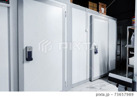 Refrigerator room door in professional kitchen in restaurant Refrigerator room door in professional kitchen in restaurant 73657989