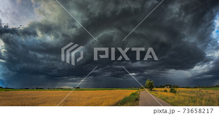 Storm clouds with shelf cloud and intense rain 73658217