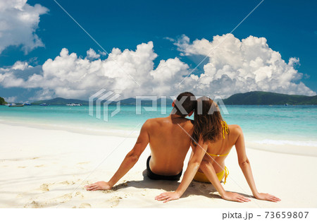Couple on a beach 73659807