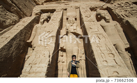 Happy Asian tourist woman travel to Egypt Abu Simbel internation historic handmark 73662506