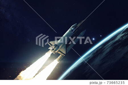 Space shuttle orbiting Earth planet. Elements of this image furnished by NASA Space shuttle orbiting Earth planet. Elements of this image furnished by NASA 73665235