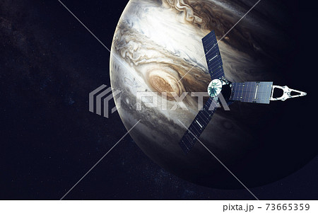 Juno spacecraft and Jupiter. Elements of this image furnished by NASA Juno spacecraft and Jupiter. Elements of this image furnished by NASA 73665359