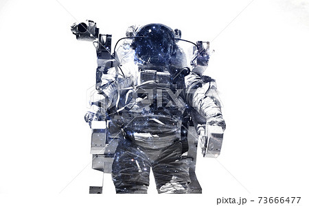 Modern space art. Astronaut at spacewalk. Dust of universe, smoke, isolated on clear white background. Elements furnished by NASA 73666477