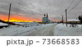 Photo of a white temple in the rays of sunset in the evening 73668583