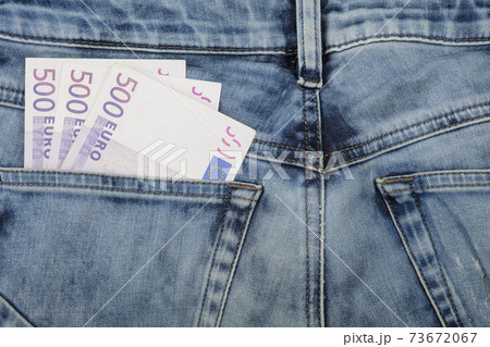 Euro paper currency banknotes in jeans back pocket 73672067