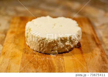 Homemade cheese made from natural milk 73675411