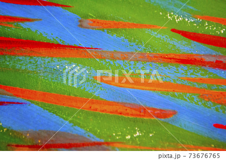 Bright varied background of colored lines of brush strokes made with paint Bright varied background of colored lines of brush strokes made with paint 73676765