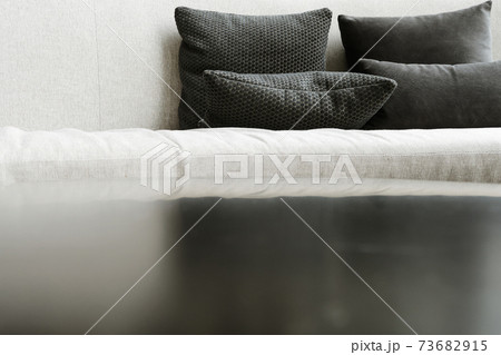 cushion on sofa 73682915