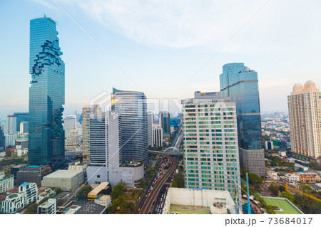 Modern office buillding and condominium sunset sky Modern office buillding and condominium sunset sky 73684017