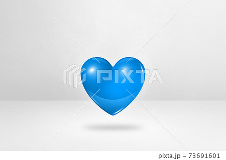3D blue heart on a white studio background 73691601