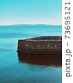 Volga river in the city of Togliatti, Russia. A wooden boat in a body of water. 73695121