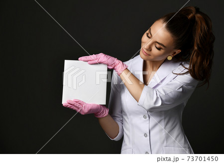 Young smiling pretty woman doctor therapist in Young smiling pretty woman doctor therapist in 73701450