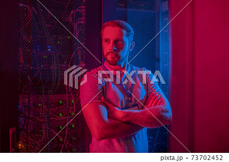 Confident calm man folded his arms across his chest 73702452