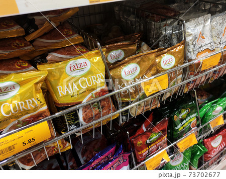 SEREMBAN, MALAYSIA -APRIL 5, 2020: Selected focused on the spices are sold in commercial packages and displayed on shelves in the supermarket. Sort by brand and type to make it easier to choose. SEREMBAN, MALAYSIA -APRIL 5, 2020: Selected focused on the spices are sold in commercial packages and displayed on shelves in the supermarket. Sort by brand and type to make it easier to choose. 73702677