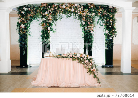 wedding table decoration with flowers on the table in the restaurant table decor for candlelit dinner 73708014
