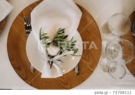 Dishes on the wedding table, decor of the dining table for the holiday 73708111