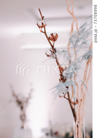 decoration with fluffy flowers on the table in winter style at the wedding decoration with fluffy flowers on the table in winter style at the wedding 73708998