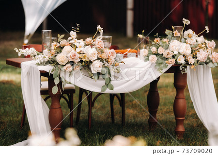 wedding table decoration with flowers on the table, dinner table decor 73709020
