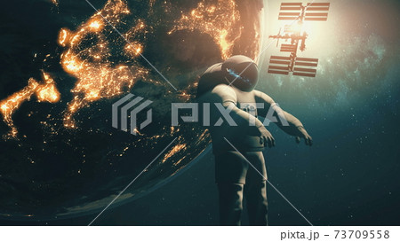 Close-up Earth spaceman of International Space Station ISS silhouette at sun. Solar system planet Close-up Earth spaceman of International Space Station ISS silhouette at sun. Solar system planet 73709558