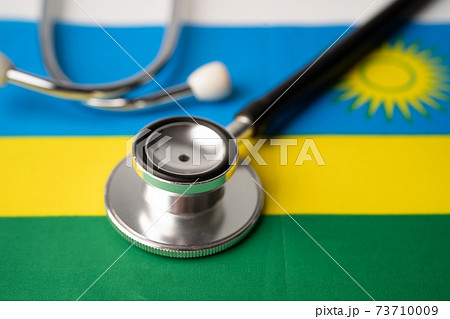 Black stethoscope on Rwanda flag background, Business and finance concept. 73710009