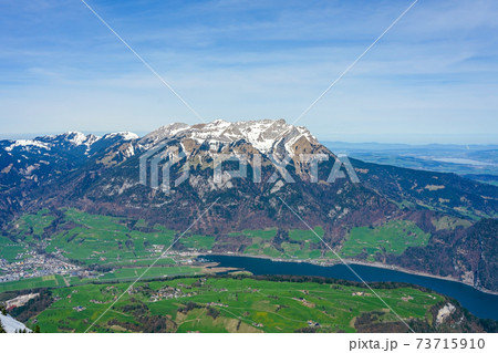Mt. Pilatus as seen from the top of Mt. Stanserhorn in the beginning of May. The Pilatus is a mountain massif overlooking the city of Lucerne in central Switzerland. Mt. Pilatus as seen from the top of Mt. Stanserhorn in the beginning of May. The Pilatus is a mountain massif overlooking the city of Lucerne in central Switzerland. 73715910