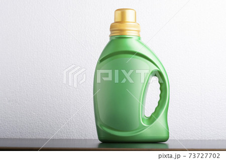 Cloth detergent liquid bottle in front of light gray background mock-up series Cloth detergent liquid bottle in front of light gray background mock-up series 73727702