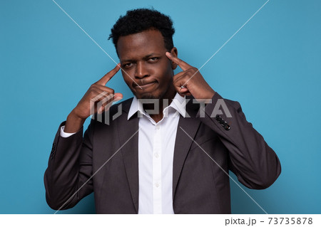 african guy tries to recollect information in mind 73735878
