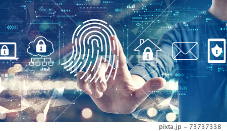 Fingerprint scanning theme with a man on city background Fingerprint scanning theme with a man on city background 73737338