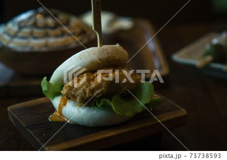 Selective focus Hirata Buns. Japanese traditional food. Asian cuisine made from steamed buns stuffed with salad and delicious savory fillings,   sandwiches or tacos 73738593