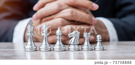 silver Chess figure team (King, Queen, Bishop, Knight, Rook and Pawn) with businessman manager background. Strategy, Success, management, business planning, tactic, thinking, vision and leader concept silver Chess figure team (King, Queen, Bishop, Knight, Rook and Pawn) with businessman manager background. Strategy, Success, management, business planning, tactic, thinking, vision and leader concept 73738888