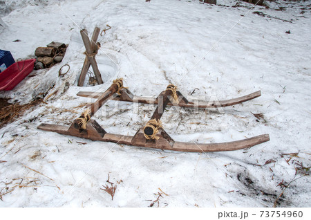 越後の農家の手作りのソリの写真素材