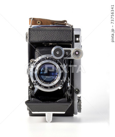 Antique old fashion film camera front view isolated on white background including clipping path 73756341