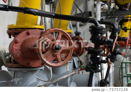 Old valves in the boiler room. 73757139