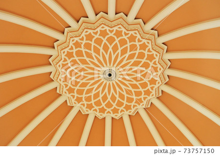 PETALING JAYA, MALAYSIA -JANUARY 01, 2015: Design under main dome of Masjid Jamek Sultan Abdul Aziz at Petaling Jaya, Malaysia. Modern mosque and community building with Islamic architecture. PETALING JAYA, MALAYSIA -JANUARY 01, 2015: Design under main dome of Masjid Jamek Sultan Abdul Aziz at Petaling Jaya, Malaysia. Modern mosque and community building with Islamic architecture. 73757150