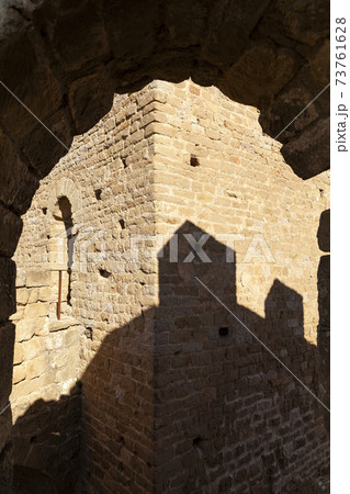 Shadows and arch Castle of Loarre, Huesca, Spain. Shadows and arch Castle of Loarre, Huesca, Spain. 73761628