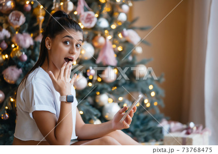Woman having video call with their family or friends. Woman having video call with their family or friends. 73768475