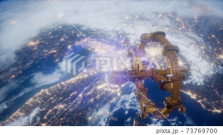 space ship over the earth seen from space. space ship over the earth seen from space. 73769700