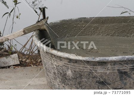 The cement mix sand in Mortar mixing tank The cement mix sand in Mortar mixing tank 73771095