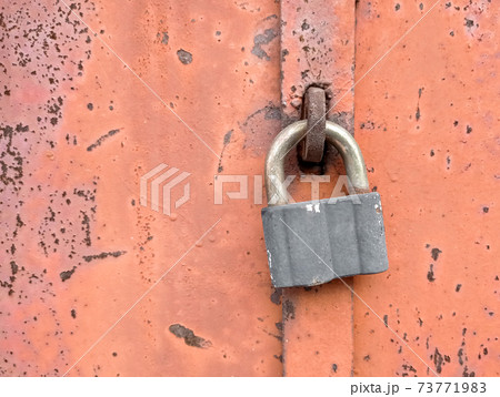 old lock on an iron door old lock on an iron door 73771983