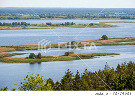 Dnipro river shores summer landscape, Kaniv water Reservoir, Kyiv Region, Ukraine. Dnipro river shores summer landscape, Kaniv water Reservoir, Kyiv Region, Ukraine. 73774933