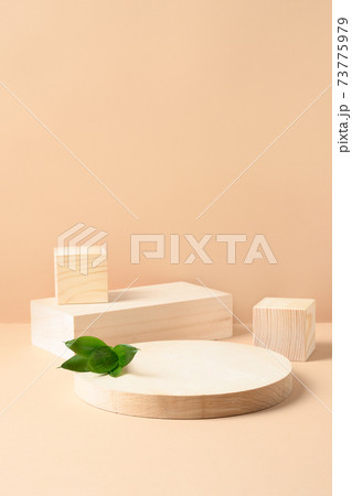 Wooden stands for product. Vertical mock up for design on beige. 73775979