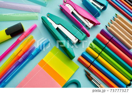 Office stationery supplies, blue background 73777327