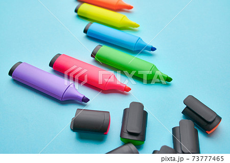Set of opened colorful permanent markers 73777465