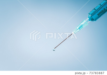 Closed up of Syringe on blue background,Medical equipment Closed up of Syringe on blue background,Medical equipment 73783887