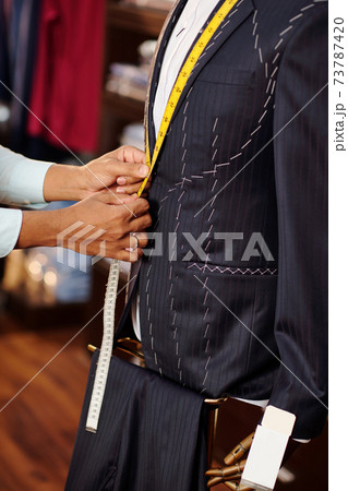 Tailor measuring jacket lapel 73787420